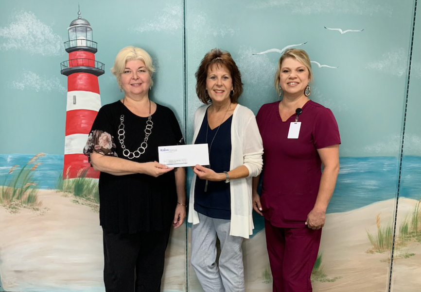 Robins Financial Credit Union Helps to Cool Lighthouse Adult Day Care Center