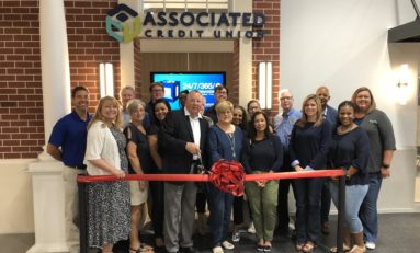 Associated Credit Union cuts ribbon on educational storefront