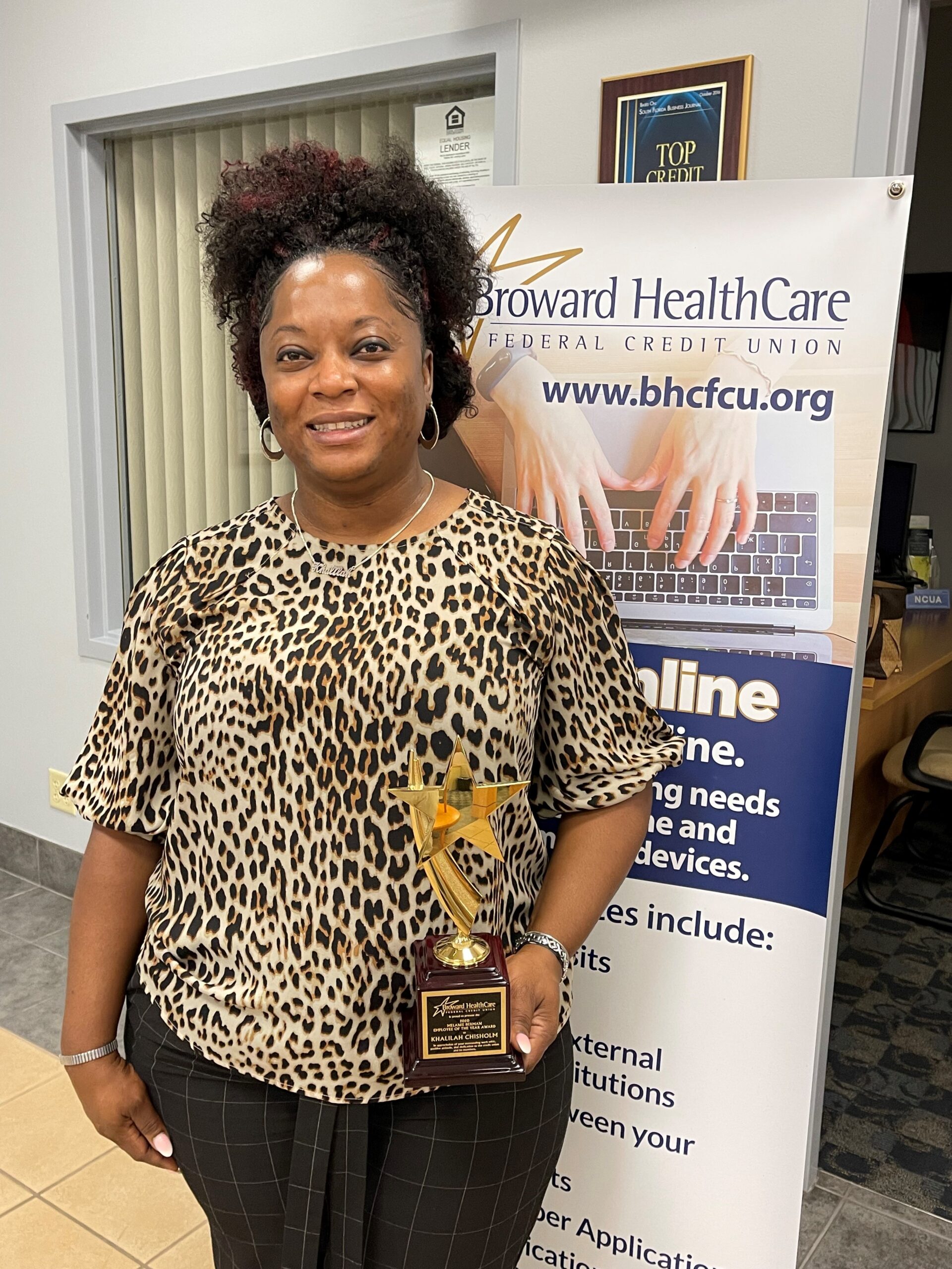 Khalilah Chisholm Receives the Employee of the Year Award from Broward HealthCare Federal Credit Union